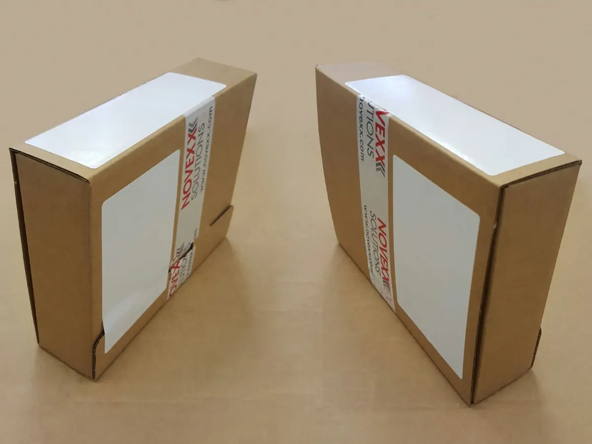 Трёхпозиционное этикетирование коробок: две боковые этикетки и верхняя контрольная наклейка на упаковке