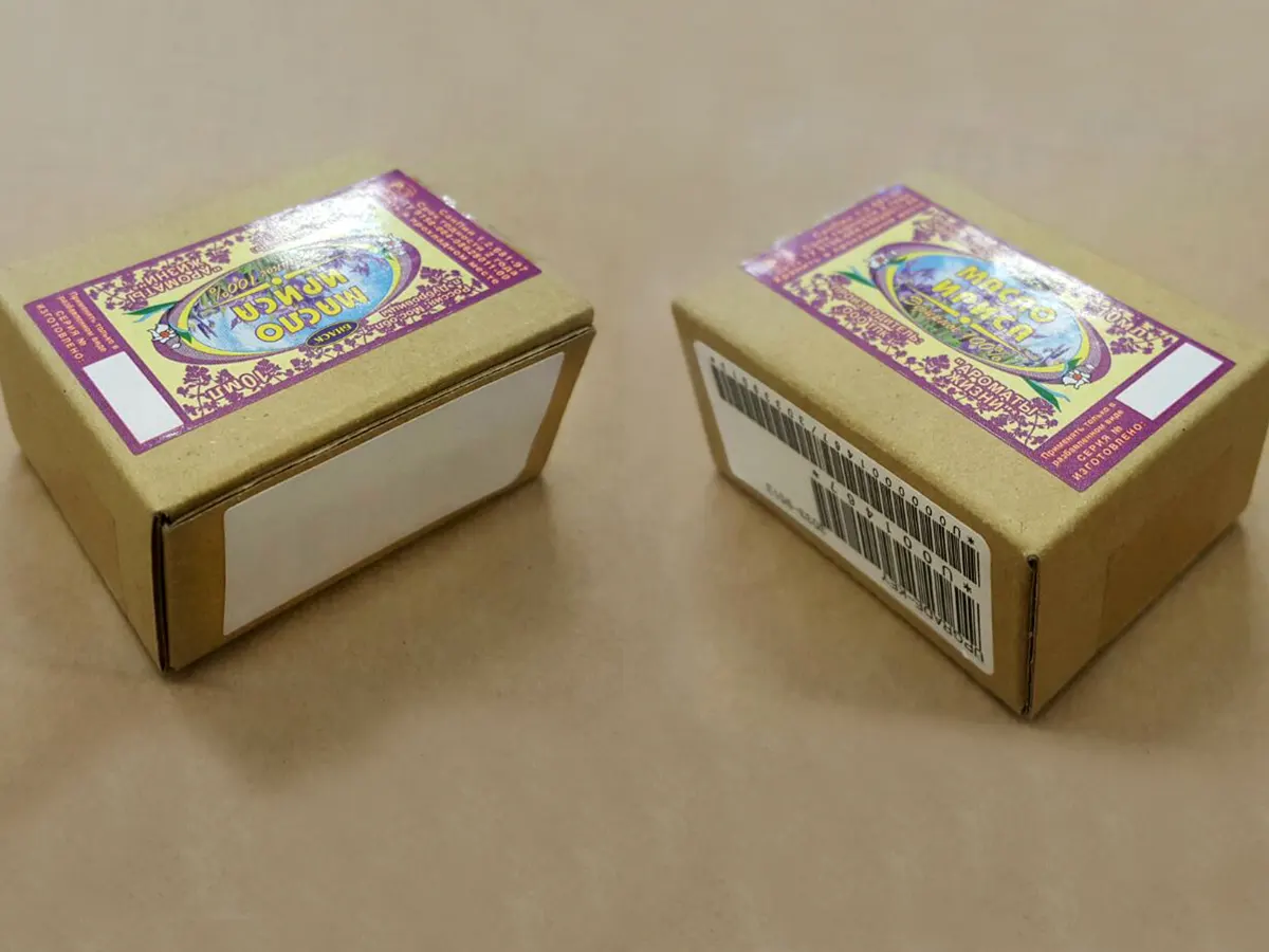 Трёхпозиционное этикетирование коробок: две боковые этикетки и верхняя контрольная наклейка на упаковке